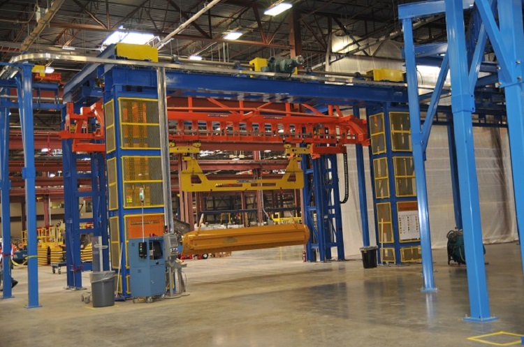 Motor Grade Finishing Line with Four Post Heavy-Duty Vertical Lift - IntelliTrak 3500 Series Overhead Conveyor