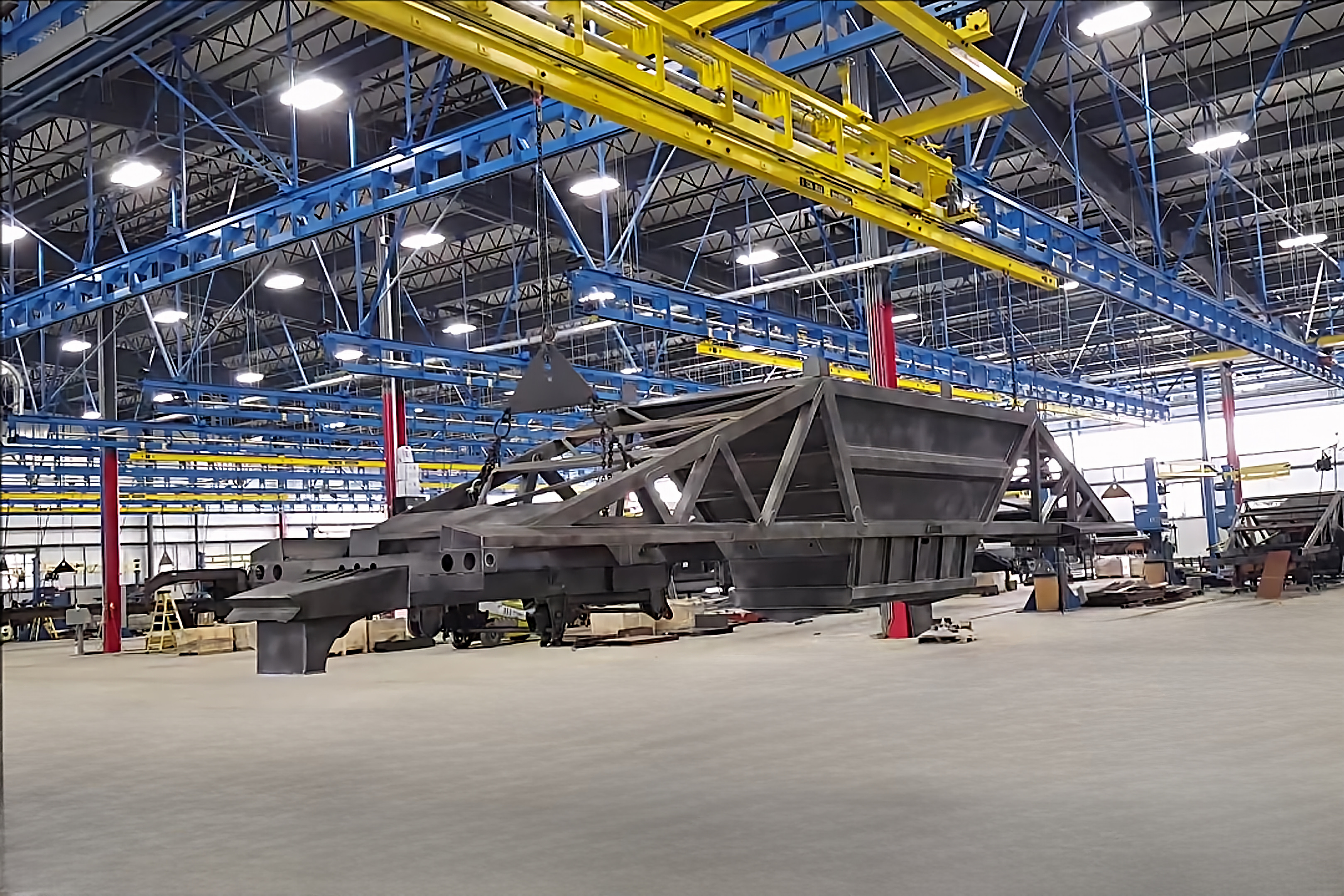 IntelliTrak 3500 Series Overhead Conveyor Finishing System for Load Trail